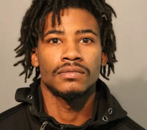 Hollis Williams, 29, was arrested and charged in the shooting of an on-duty firefighter last week. (Photo/Chicago Police Department)