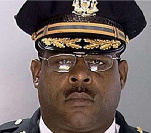 Inspector Carl Holmes has been charged with sexually assaulting three female police officers.