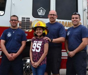 Kaylee Moreno with Rural Metro firefighters from station 842.