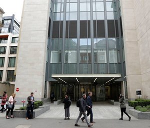 An exterior view shows the main entrance of St Bartholomew's Hospital, in London, one of the hospitals whose computer systems were affected by a cyberattack. (AP Photo/Matt Dunham)