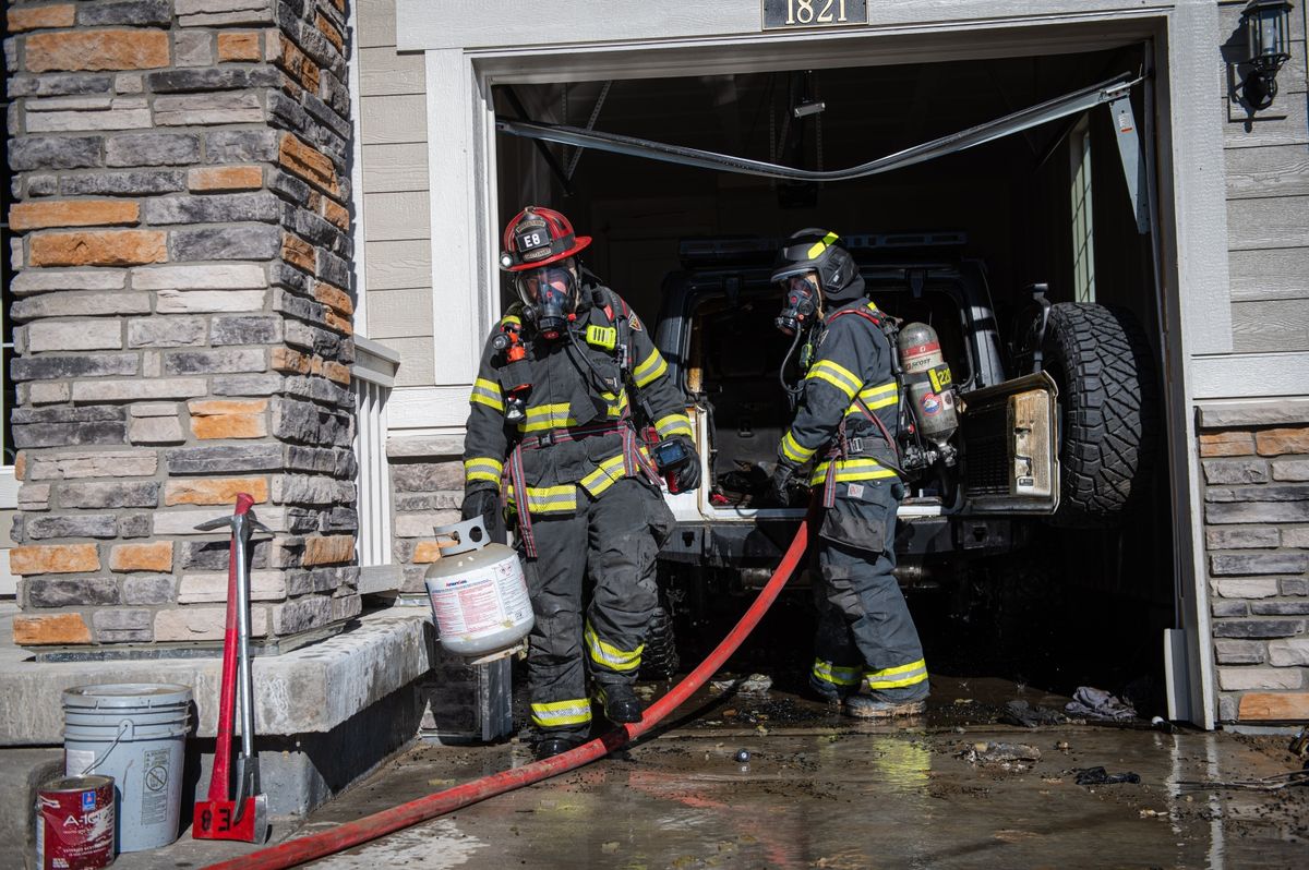 Photos Hybrid Jeep explosion sends garage door flying