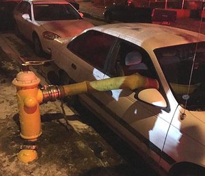 Firefighters had to break the windows of a vehicle to secure water supply.