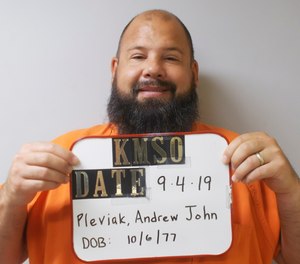 In this photo provided by the Kingman County Sheriff's Office, Andrew John Pleviak is pictured in a booking photo dated Sept. 4, 2019.