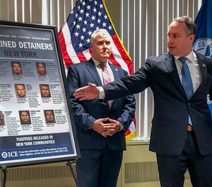 Matthew Albence, right, the acting director of U.S. Immigration and Customs Enforcement, blamed the