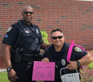 Officer Sydney Wilcox and Officer Zalenski pictured on their first day back at school.