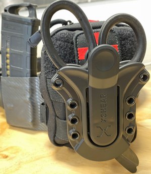 Mounting XShears to your IFAK with a Tactical Holster will make sure they are there when you need them.