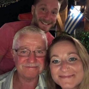 West Midlands Ambulance Service EMT Jeremy Daw (left, in foreground), 66, was killed after an object went through the windshield of his ambulance on Saturday, officials say. Daw had come out of retirement as a former paramedic to assist during the ongoing pandemic.