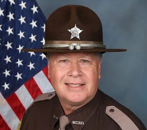 Deputy John Durm, 61, was killed by a murder suspect after a solo transport to a hospital.