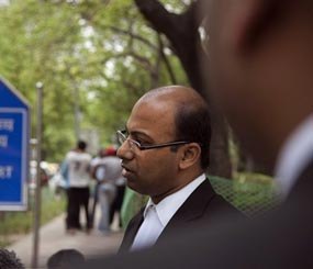 In this Thursday, April 17, 2014 file photo, Samarjeet Pattnaik, attorney of a New York City police officer Manny Encarnacion, speaks to the media in New Delhi, India.