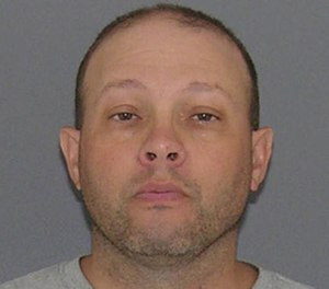 This photo provided by the Hamilton County Sheriff's Office in Cincinnati, Ohio on Monday, Aug. 1, 2016 shows Indianapolis police officer Adrian Aurs.