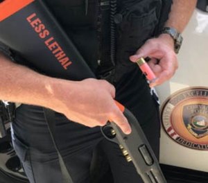Corvallis PD repurposed its 12-gauge pump action shotguns for use as less-lethal weapons by fitting them with orange stocks labeled “less-lethal,” and orange fore-ends.