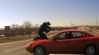 'Stop the car!': BWC shows Iowa officer clinging to roof of suspect's car