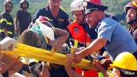 Italian firefighters pull 3 children from rubble on quake-hit island