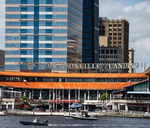 The coast guard patrols the St John's river outside of the Jacksonville Landing in Jacksonville.