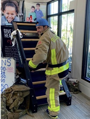 J.C. completed the Mt. Everest Challenge by climbing 29,032 feet on a Jacobs Ladder to raise funds for a foundation that will help foster children be adopted.
