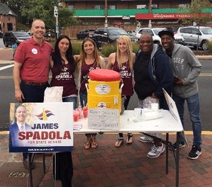 James Spadola (far left) and friends give out free water ice in Wilmington, Delaware, September 2016.