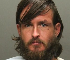 Jason Coleman was arrested for assaulting a firefighter at the scene of a call. (Photo/Tucson Police Dept.)