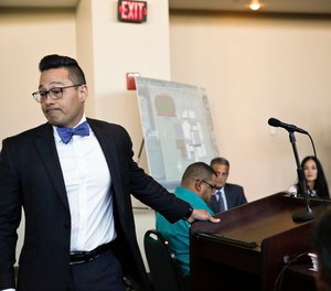 Joseph DiRuzzo, attorney for former Broward County Deputy Scot Peterson, walks away after speaking before the Marjory Stoneman Douglas High School Public Safety Commission on Thursday, Nov. 15, 2018, in Sunrise, Fla. Peterson sent his attorney instead of appearing before the commission who are investigating the Feb. 14 shooting at the Parkland, Fla., high school, where the now-retired deputy was assigned to guard.