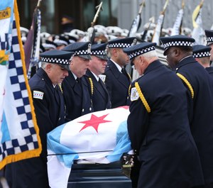 The casket of fallen Chicago Police officer Samuel Jimenez is carried to St. Joseph's Chapel at the Our Lady of Guadalupe Shrine in Des Plaines for the funeral service on Nov. 26, 2018. Jimenez was slain along with two others the previous week at a Near South Side hospital. (Chris Walker/Chicago Tribune/TNS)