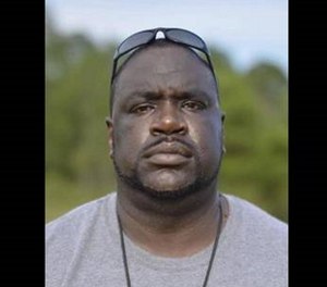 Joseph Foster was hired by the state Department of Corrections in December 2009. (Courtesy photo)