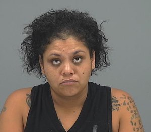 Shaina Johns, 28, was charged with aggravated assault for allegedly biting a paramedic at a hospital while she was already in police custody. (Photo/Pinal County Adult Detention Center)