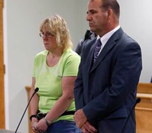 Joyce Mitchell, left, stands with her attorney Keith Bruno as she is arraigned in City Court on Friday.