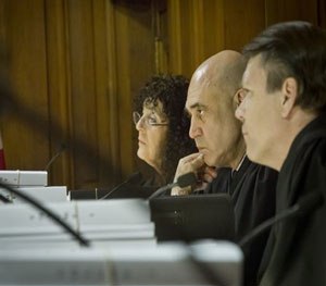 Appellate court judges listen to arguments in the videotaped chokehold death of Eric Garner, Tuesday, June 16, 2015, in New York. (AP Image)