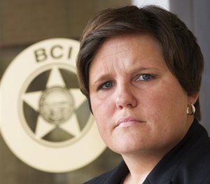Stacey Fifer, a special agent for the Ohio Bureau of Criminal Investigation, stands for a photo at her office in Richfield, Ohio on Tuesday, May 5, 2015. (AP Image)
