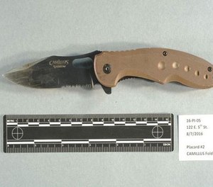 Pictured is a knife police say was recovered at the scene of the shooting.