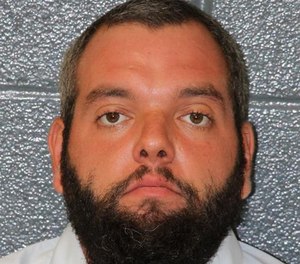 Kyle Harris, of Charlotte, N.C., pictured in a mugshot. Harris pleaded guilty on Monday to two counts of sexual activity by a custodian related to an attack on a 20-year-old transgender inmate in May 2021. (Photo Mecklenberg County Sheriff's Office)