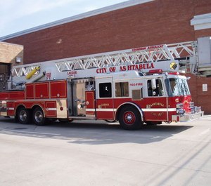 An Ashtabula firefighter became temporarily trapped trying to retrieve a naked woman who reentered her burning house and resisted being rescued. (Photo/City of Ashtabula)