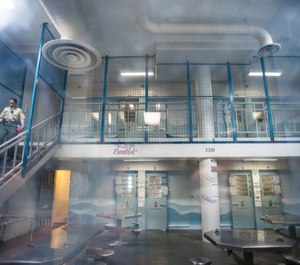 A corrections officer makes rounds in one of the pods of the Women’s Jail in Lynwood on Dec. 18, 2017. Officials Tuesday began the process of overhauling the county's failing jail system.