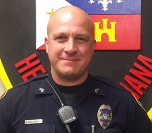 This photo provided by the Lafayette Police Department shows Cpl. Michael Paul Middlebrook, a nine-year patrol veteran who was shot and killed in the line of duty late Sunday, Oct. 1, 2017. (Lafayette Police Department via AP)