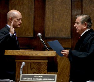 Kane County State's Attorney Joseph McMahon is sworn in by Judge Vincent Gaughan as the independent attorney to prosecute Chicago police Officer Jason Van Dyke during a hearing Thursday, Aug. 4, 2016 at the Leighton Criminal Courts Building in Chicago.