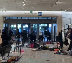 As many as 50 people barged into a Canoga Park Nordstrom store September 12.