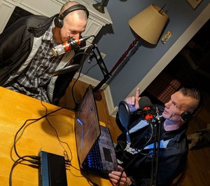Tim Galbraith (left) and Joe Davis record an episode of their new podcast