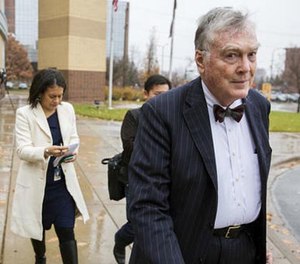 St. Anthony police officer Jeronimo Yanez's attorney Tom Kelly leaves the Ramsey County Law Enforcement Center shortly after Yanez's first appearance in court in St. Paul, Minn., on Friday, Nov. 18, 2016.