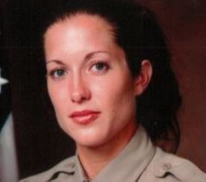Detective Amber Leist was struck and killed by a car Sunday morning after she helped an elderly woman cross the street.