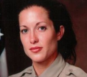 Detective Amber Leist was struck and killed by a car Sunday morning after she helped an elderly woman cross the street.