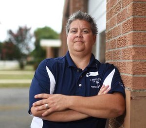 In this Aug. 5, 2016 file photo, Latta police chief Crystal Moore poses for a portrait, in Latta, S.C.