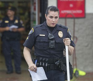 Officer Christine Garcia at the scene of a felony hit and run traffic accident in San Diego on September 21, 2016. Garcia is assigned to the traffic division. She is the first transgender officer to go public in the department.
