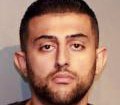 In this photo provided by the New York State Police, Nauman Hussain is shown after his arrest, Wednesday, Oct. 10, 2018 in Latham, N.Y. Police charged the limousine service operator Wednesday with criminally negligent homicide in a crash that killed 20 people on Saturday, Oct. 6, 2018. (New York State Police via AP)