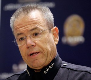 In this July 24, 2018, file photo Los Angeles Police Chief Michel Moore speaks at a news conference at police headquarters in Los Angeles. Moore, who became chief in 2018, announced Monday, Jan. 28, 2019, that crime is down in every category in Los Angeles and homicides are at their second lowest in more than 50 years.