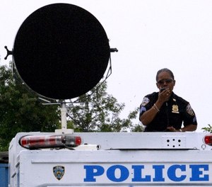 New York City Police Sgt. Janet Jordan gives orders using a Long Range Acoustic Device during a training drill in preparation for the Republican National Convention, Thursday, Aug, 19, 2004 in New York.