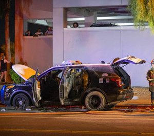 Instead of dispersing after the downtown Las Vegas protest was declared unlawful late Saturday, three men stuck around to set a Metro Police vehicle on fire.
