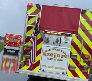 An Ohio medic vehicle responding to a single-car crash was struck by a semitrailer Tuesday morning, killing the semi driver and injuring a passenger and two of the medic crew. (Photo/Enon-Mad River Township Fire and EMS)