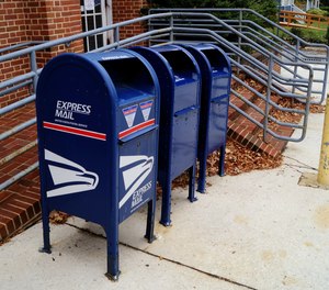A surveillance camera caught Jay Yang “fishing” for mail at a post office on several occasions.