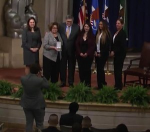 Suffolk County Detective William Maldonado's family was honored with a posthumous award for his work on the FBI task force that helped prosecute more than 40 MS-13 members. (Photo/TNS)