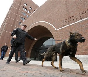 Police patrol outside federal court in Boston Thursday, April 30, 2015, during the penalty phase in the trial of Dzhokhar Tsarnaev. (AP Image)