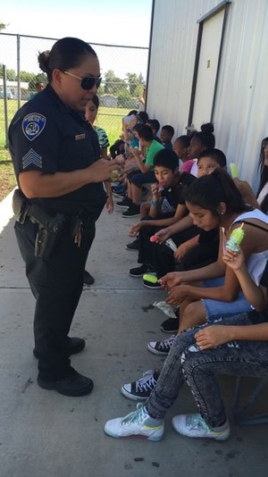 Lt. Haskins enjoys speaking with local children to share her experience in law enforcement.
